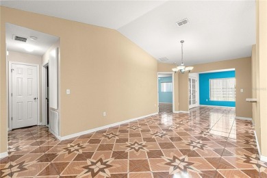 Welcome to this Lovely Extended Palm Model 2 Bedroom 2 Bathroom on The Links of Spruce Creek in Florida - for sale on GolfHomes.com, golf home, golf lot