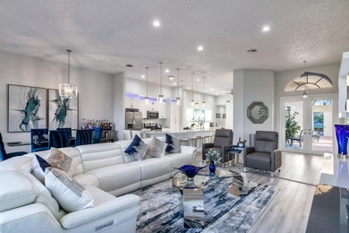 TOTALLY TOTALLY UPDATED A MUST SEE! TRANQUIL COURTYARD HEATED on Wycliffe Golf and Country Club in Florida - for sale on GolfHomes.com, golf home, golf lot