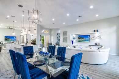 TOTALLY TOTALLY UPDATED A MUST SEE! TRANQUIL COURTYARD HEATED on Wycliffe Golf and Country Club in Florida - for sale on GolfHomes.com, golf home, golf lot