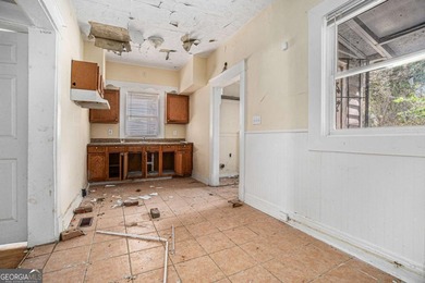 Sold as-is, this investor-friendly ranch home presents a rare on John A. White Golf Course in Georgia - for sale on GolfHomes.com, golf home, golf lot