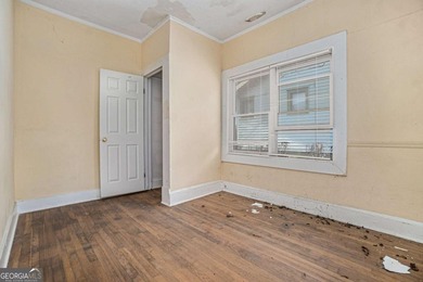 Sold as-is, this investor-friendly ranch home presents a rare on John A. White Golf Course in Georgia - for sale on GolfHomes.com, golf home, golf lot