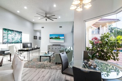 TOTALLY TOTALLY UPDATED A MUST SEE! TRANQUIL COURTYARD HEATED on Wycliffe Golf and Country Club in Florida - for sale on GolfHomes.com, golf home, golf lot