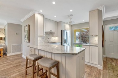 This amazing second floor end-unit is a show stopper! It on The Glades Golf and Country Club in Florida - for sale on GolfHomes.com, golf home, golf lot