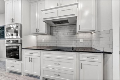 Tucked into the wooded hills of Bella Vista, this home delivers on Bella Vista Country Club - Highlands in Arkansas - for sale on GolfHomes.com, golf home, golf lot