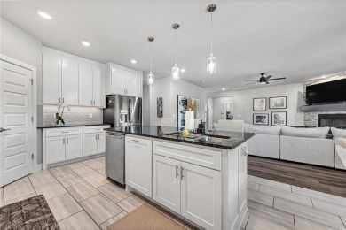 Tucked into the wooded hills of Bella Vista, this home delivers on Bella Vista Country Club - Highlands in Arkansas - for sale on GolfHomes.com, golf home, golf lot