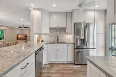 This amazing second floor end-unit is a show stopper! It on The Glades Golf and Country Club in Florida - for sale on GolfHomes.com, golf home, golf lot