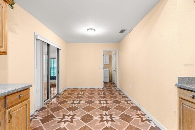 Welcome to this Lovely Extended Palm Model 2 Bedroom 2 Bathroom on The Links of Spruce Creek in Florida - for sale on GolfHomes.com, golf home, golf lot