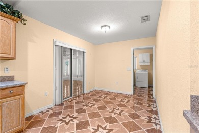 Welcome to this Lovely Extended Palm Model 2 Bedroom 2 Bathroom on The Links of Spruce Creek in Florida - for sale on GolfHomes.com, golf home, golf lot
