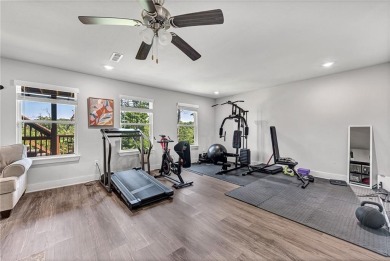 Tucked into the wooded hills of Bella Vista, this home delivers on Bella Vista Country Club - Highlands in Arkansas - for sale on GolfHomes.com, golf home, golf lot