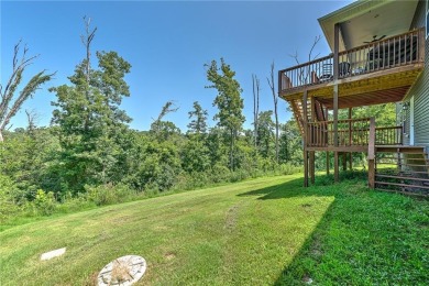 Tucked into the wooded hills of Bella Vista, this home delivers on Bella Vista Country Club - Highlands in Arkansas - for sale on GolfHomes.com, golf home, golf lot