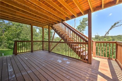 Tucked into the wooded hills of Bella Vista, this home delivers on Bella Vista Country Club - Highlands in Arkansas - for sale on GolfHomes.com, golf home, golf lot