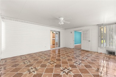 Welcome to this Lovely Extended Palm Model 2 Bedroom 2 Bathroom on The Links of Spruce Creek in Florida - for sale on GolfHomes.com, golf home, golf lot