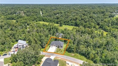Tucked into the wooded hills of Bella Vista, this home delivers on Bella Vista Country Club - Highlands in Arkansas - for sale on GolfHomes.com, golf home, golf lot