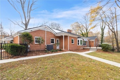 Welcome to this beautiful brick ranch with a walkout basement on Oak Hills Golf and Event Center in North Carolina - for sale on GolfHomes.com, golf home, golf lot