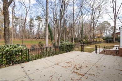 Welcome to this beautiful brick ranch with a walkout basement on Oak Hills Golf and Event Center in North Carolina - for sale on GolfHomes.com, golf home, golf lot