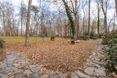 Welcome to this beautiful brick ranch with a walkout basement on Oak Hills Golf and Event Center in North Carolina - for sale on GolfHomes.com, golf home, golf lot