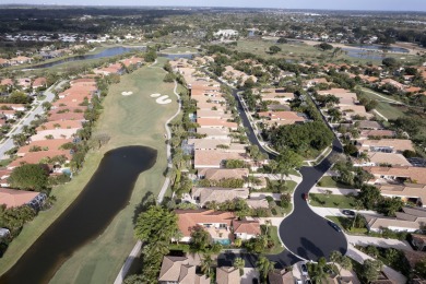 TOTALLY TOTALLY UPDATED A MUST SEE! TRANQUIL COURTYARD HEATED on Wycliffe Golf and Country Club in Florida - for sale on GolfHomes.com, golf home, golf lot