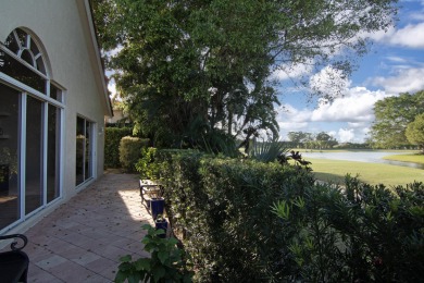 TOTALLY TOTALLY UPDATED A MUST SEE! TRANQUIL COURTYARD HEATED on Wycliffe Golf and Country Club in Florida - for sale on GolfHomes.com, golf home, golf lot