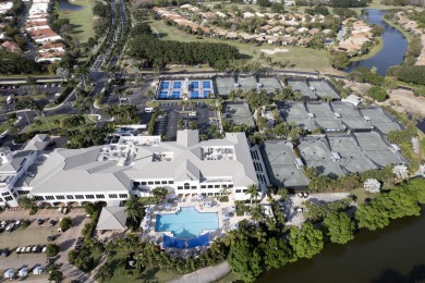 TOTALLY TOTALLY UPDATED A MUST SEE! TRANQUIL COURTYARD HEATED on Wycliffe Golf and Country Club in Florida - for sale on GolfHomes.com, golf home, golf lot
