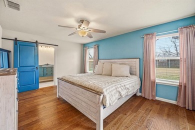 Step into this beautifully updated 3-bedroom, 2-bath home, where on Pecan Plantation Country Club in Texas - for sale on GolfHomes.com, golf home, golf lot