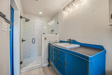 Step into this beautifully updated 3-bedroom, 2-bath home, where on Pecan Plantation Country Club in Texas - for sale on GolfHomes.com, golf home, golf lot