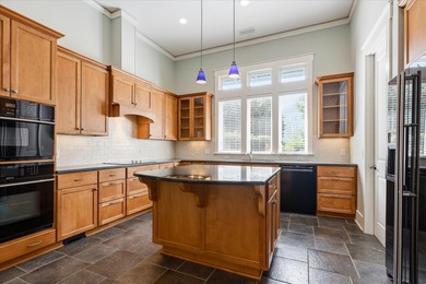 Located in the heart of Southwood, this exceptional home offers on Southwood Golf Club in Florida - for sale on GolfHomes.com, golf home, golf lot