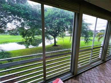 SPECTACULAR EXPANSIVE WATER/GOLF VIEW from this REMODELED 2nd on Wynmoor Golf Course in Florida - for sale on GolfHomes.com, golf home, golf lot