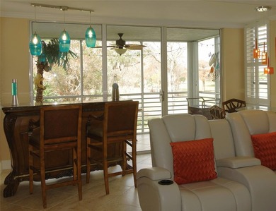 Desirable F Model! This stunning 3/2 and half offers a blend of on Palm-Aire Country Club and Resort - Palms in Florida - for sale on GolfHomes.com, golf home, golf lot