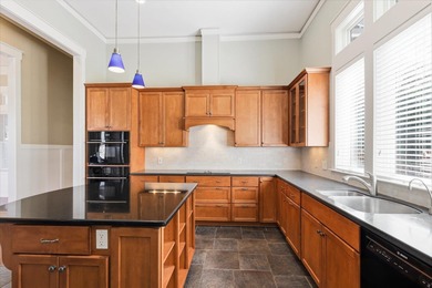 Located in the heart of Southwood, this exceptional home offers on Southwood Golf Club in Florida - for sale on GolfHomes.com, golf home, golf lot