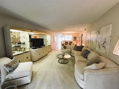 SPECTACULAR EXPANSIVE WATER/GOLF VIEW from this REMODELED 2nd on Wynmoor Golf Course in Florida - for sale on GolfHomes.com, golf home, golf lot