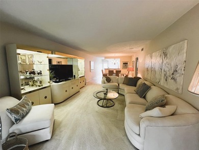 SPECTACULAR EXPANSIVE WATER/GOLF VIEW from this REMODELED 2nd on Wynmoor Golf Course in Florida - for sale on GolfHomes.com, golf home, golf lot