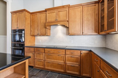 Located in the heart of Southwood, this exceptional home offers on Southwood Golf Club in Florida - for sale on GolfHomes.com, golf home, golf lot