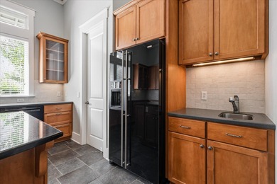 Located in the heart of Southwood, this exceptional home offers on Southwood Golf Club in Florida - for sale on GolfHomes.com, golf home, golf lot