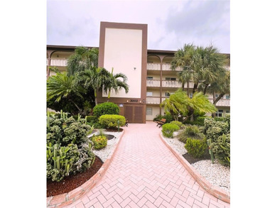 SPECTACULAR EXPANSIVE WATER/GOLF VIEW from this REMODELED 2nd on Wynmoor Golf Course in Florida - for sale on GolfHomes.com, golf home, golf lot