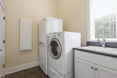 Located in the heart of Southwood, this exceptional home offers on Southwood Golf Club in Florida - for sale on GolfHomes.com, golf home, golf lot