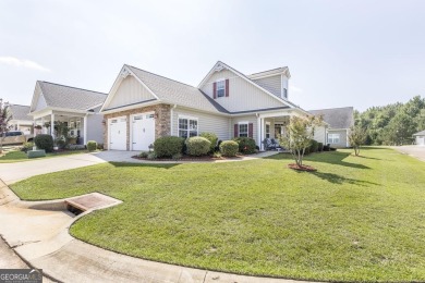 Discover this charming 2-bedroom, 2-bathroom, 2 car garage home on Houston Springs Resort and Golf Course in Georgia - for sale on GolfHomes.com, golf home, golf lot