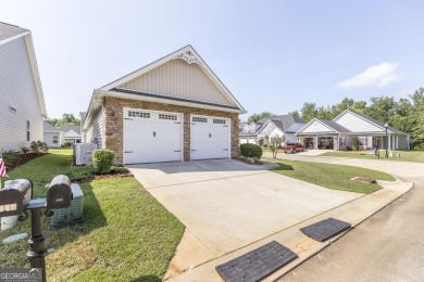 Discover this charming 2-bedroom, 2-bathroom, 2 car garage home on Houston Springs Resort and Golf Course in Georgia - for sale on GolfHomes.com, golf home, golf lot