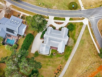 Located in the heart of Southwood, this exceptional home offers on Southwood Golf Club in Florida - for sale on GolfHomes.com, golf home, golf lot