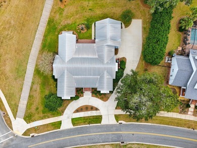 Located in the heart of Southwood, this exceptional home offers on Southwood Golf Club in Florida - for sale on GolfHomes.com, golf home, golf lot