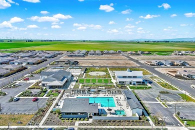 This 50+ community offers a guest house, pool, recreation area on Golf Club At Rio Vista in California - for sale on GolfHomes.com, golf home, golf lot