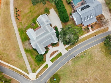 Located in the heart of Southwood, this exceptional home offers on Southwood Golf Club in Florida - for sale on GolfHomes.com, golf home, golf lot