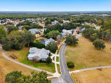 Located in the heart of Southwood, this exceptional home offers on Southwood Golf Club in Florida - for sale on GolfHomes.com, golf home, golf lot