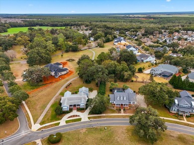 Located in the heart of Southwood, this exceptional home offers on Southwood Golf Club in Florida - for sale on GolfHomes.com, golf home, golf lot