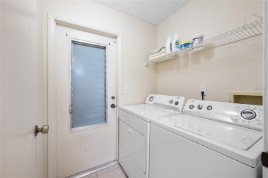 Welcome to your next dream home nestled in the picturesque on Highland Lakes Executive Golf Course in Florida - for sale on GolfHomes.com, golf home, golf lot