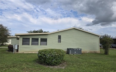 2-BEDROOM 2 BATH home, beautifully remodeled home with bonus on Zellwood Station Country Club in Florida - for sale on GolfHomes.com, golf home, golf lot