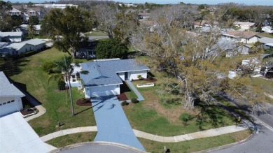 Welcome to your next dream home nestled in the picturesque on Highland Lakes Executive Golf Course in Florida - for sale on GolfHomes.com, golf home, golf lot