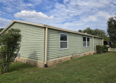 2-BEDROOM 2 BATH home, beautifully remodeled home with bonus on Zellwood Station Country Club in Florida - for sale on GolfHomes.com, golf home, golf lot