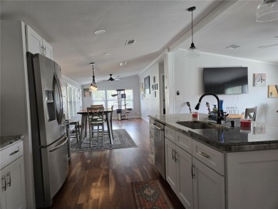 2-BEDROOM 2 BATH home, beautifully remodeled home with bonus on Zellwood Station Country Club in Florida - for sale on GolfHomes.com, golf home, golf lot