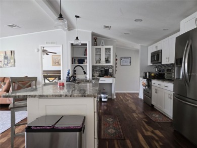 2-BEDROOM 2 BATH home, beautifully remodeled home with bonus on Zellwood Station Country Club in Florida - for sale on GolfHomes.com, golf home, golf lot