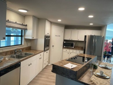 TIRED OF SNOW,ICE AND COLD, TRADE IT IN FOR SUN,WARM AND WHITE on Del Tura Golf and Country Club in Florida - for sale on GolfHomes.com, golf home, golf lot
